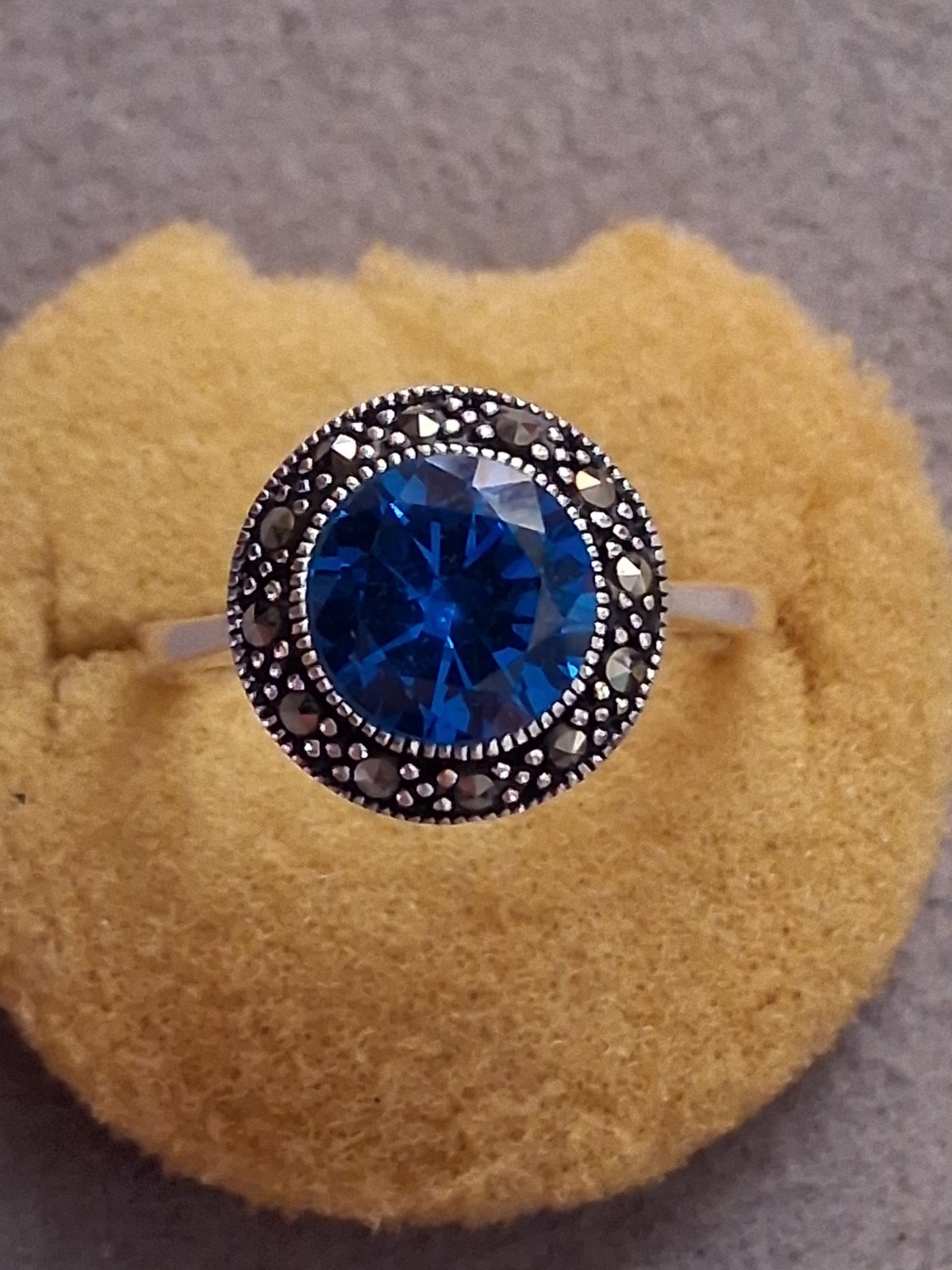 Blue faceted & marcasite halo ring, silverplated, round setting, SZ 6.75