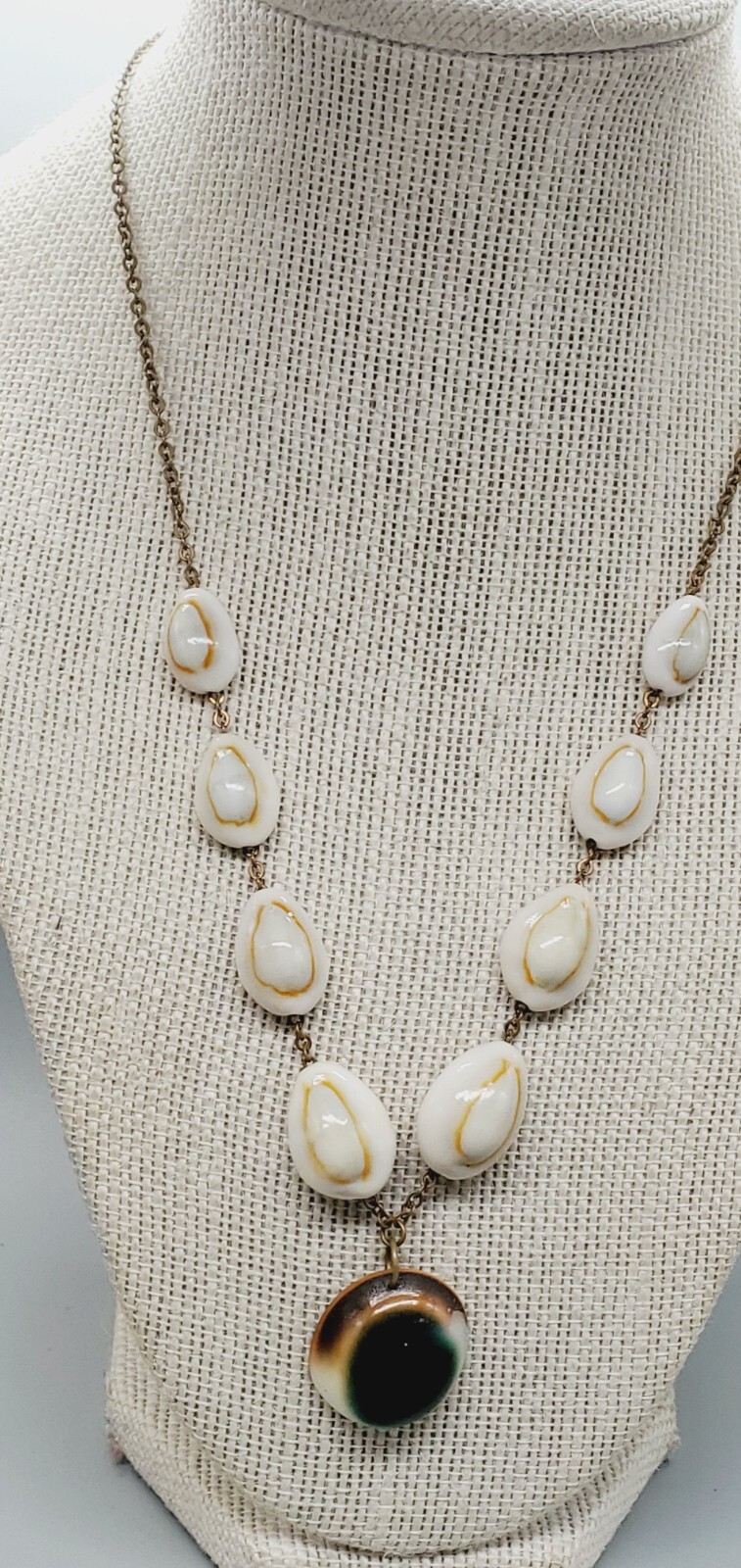 Creamy & Brown Cowrie Shells w/ green and brown sea pendant necklace ne02