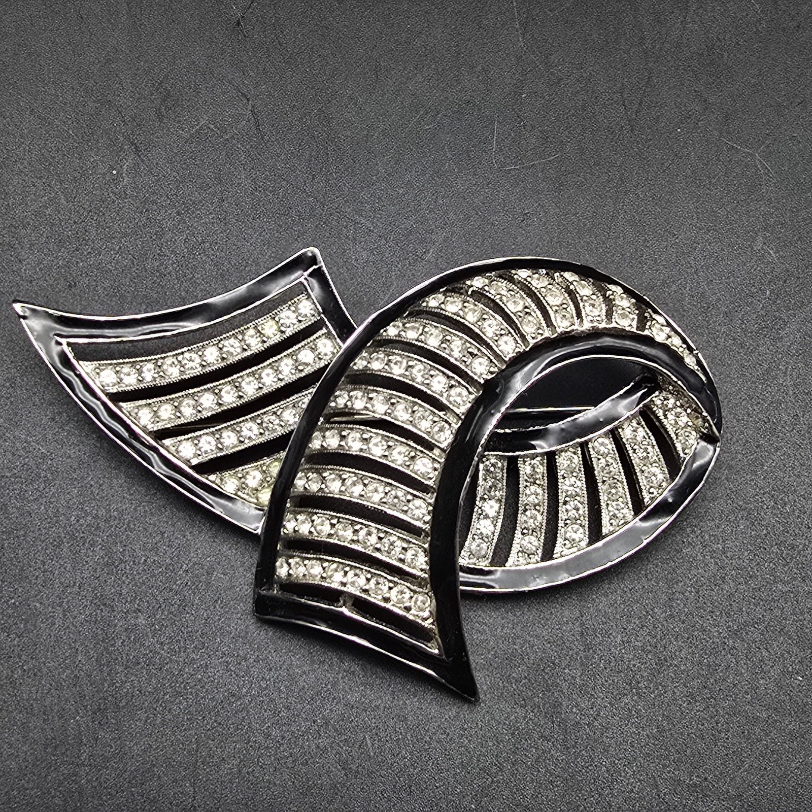Les Bernard Swirl Ribbon Rhinestone Brooch Black Enamel Silver Tone