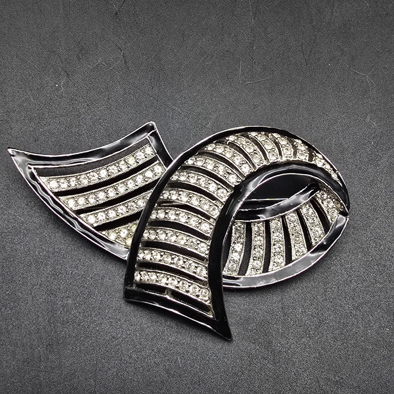 Les Bernard Swirl Ribbon Rhinestone Brooch Black Enamel Silver Tone