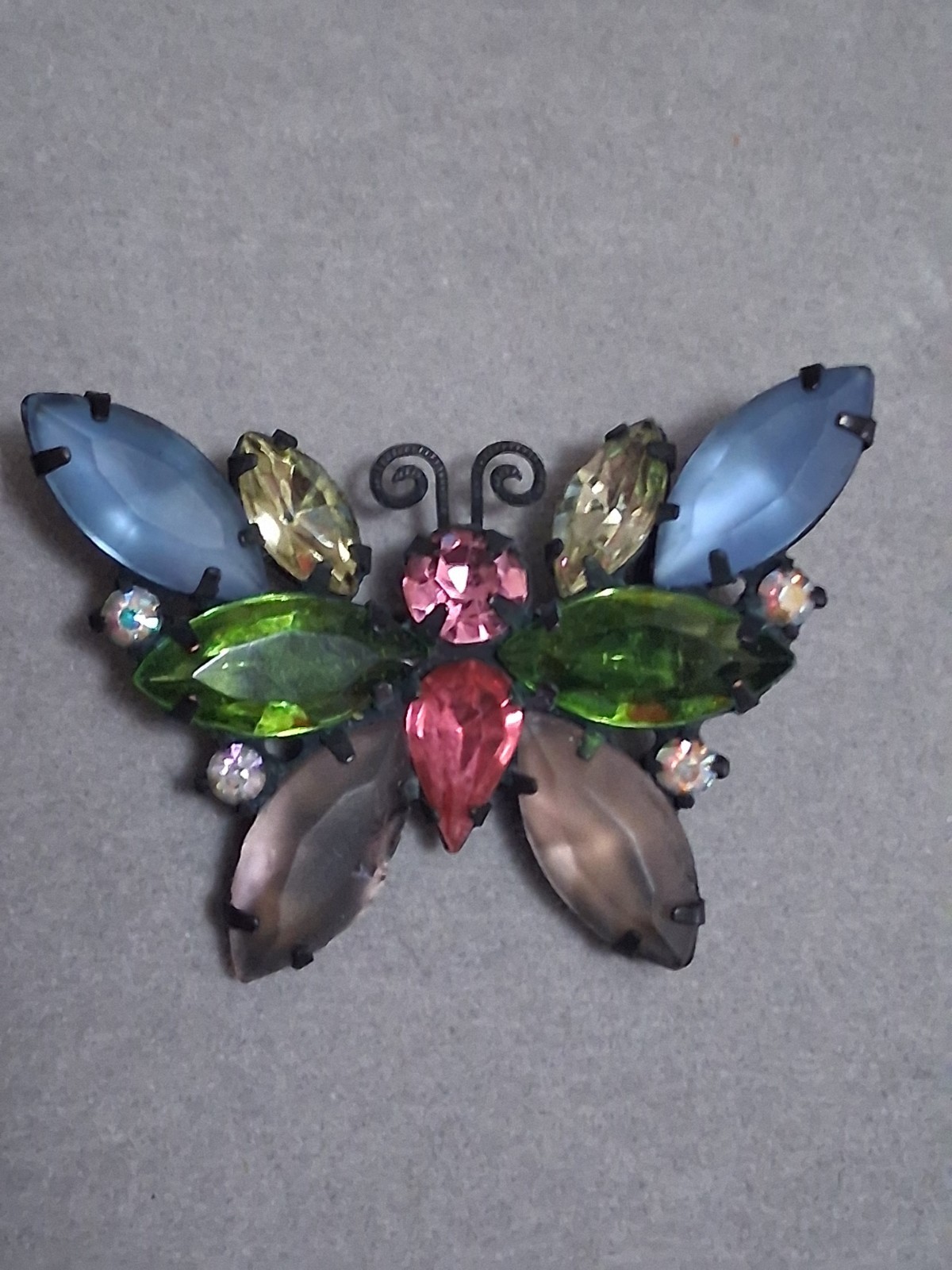 Vintage Juliana butterfly brooch multi color & shape prong set stones