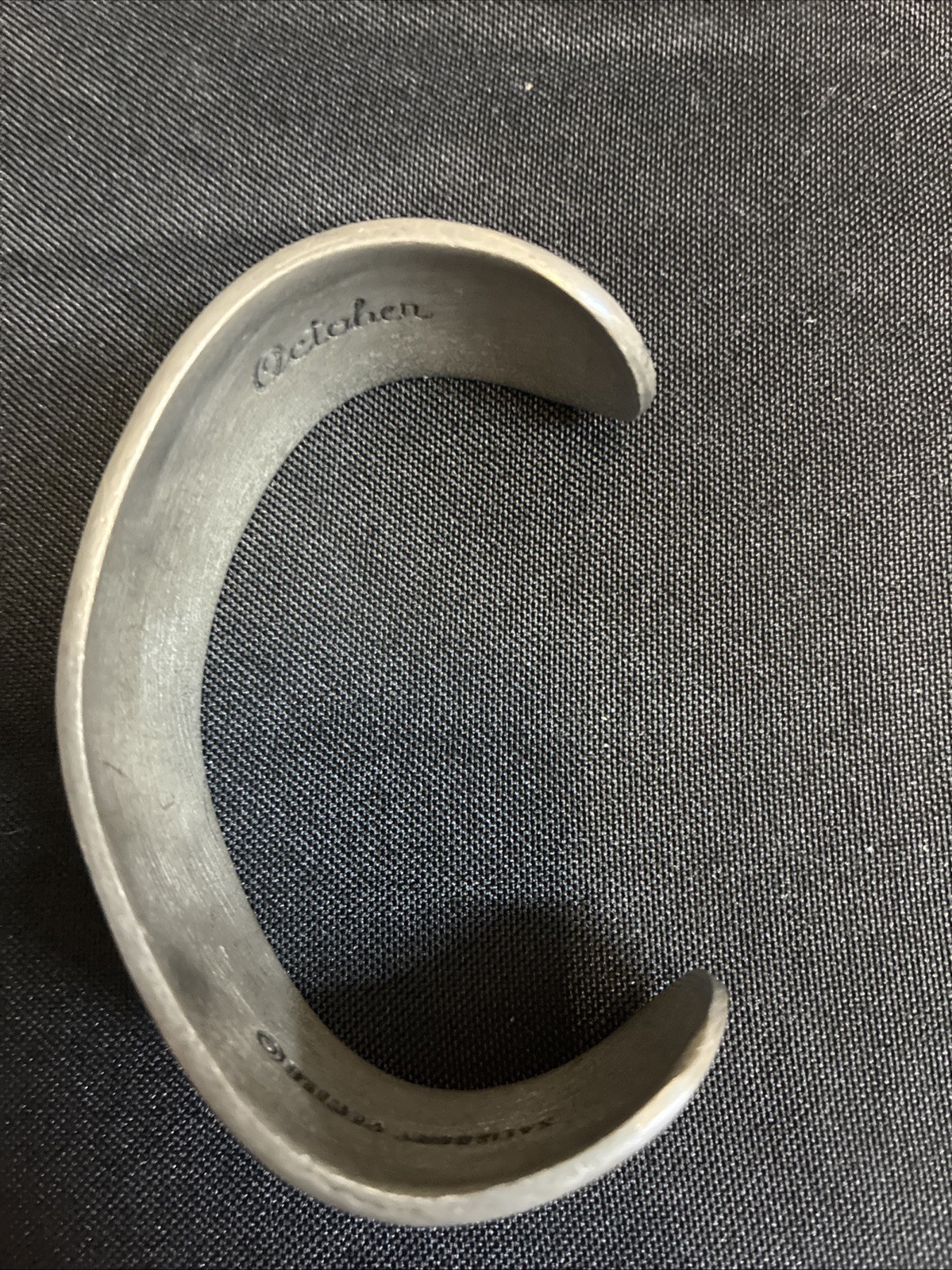 Vintage cuff bracelet marked Salisbury Pewter Engraved With ‘October’