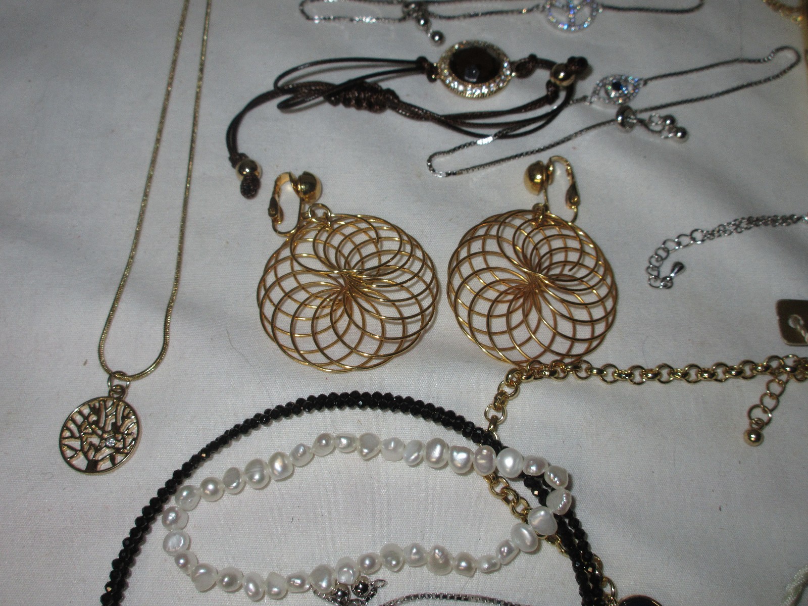 47 Pc. FASHION JEWELRY Bracelets, watches, necklaces, etc.