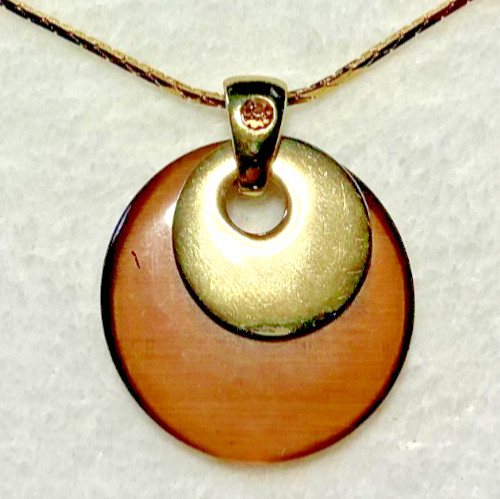 Vintage Brown Acrylic Disc Pendant with a brown rhinestone and Gold Tone Chain