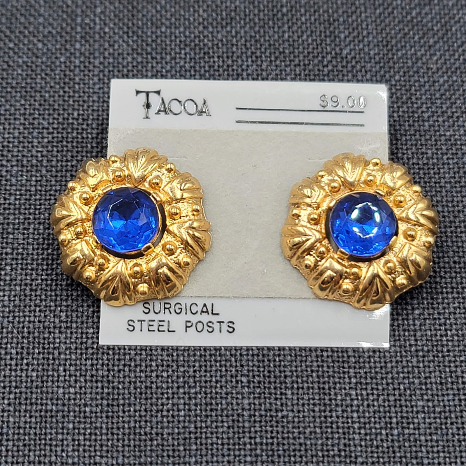Vintage Tacoa Blue Rhinestone Pierced Earrings Embossed Gold tone NOS 1″