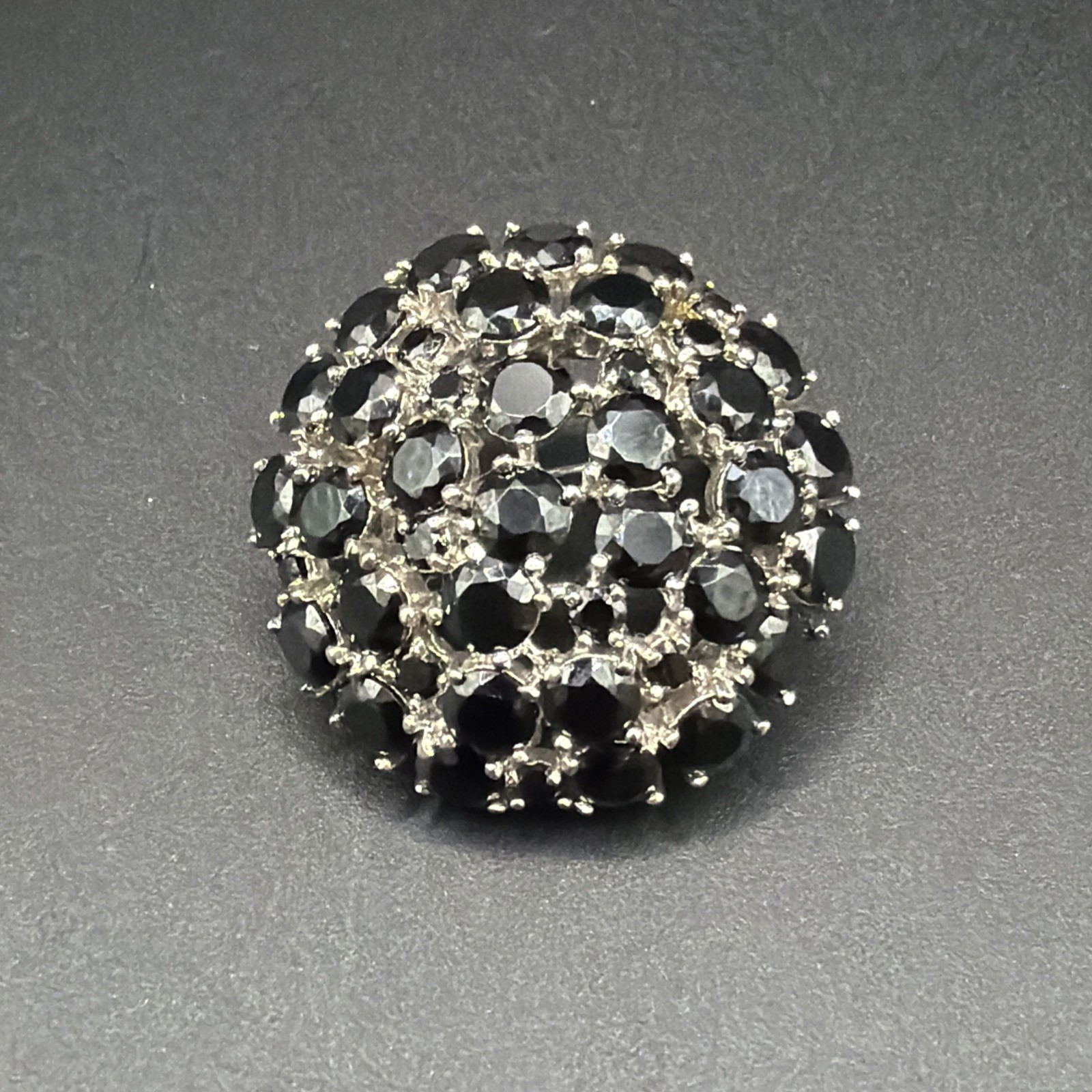 Vintage Warner Black Faceted Rhinestone Cluster Round Domed Brooch Gold Tone