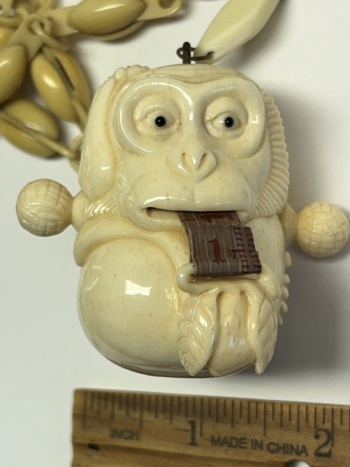 ANTIQUE ART DECO MONKEY NECKLACE TAPE MEASURE CELLULOID CHAIN PENDANT WHIMSICAL