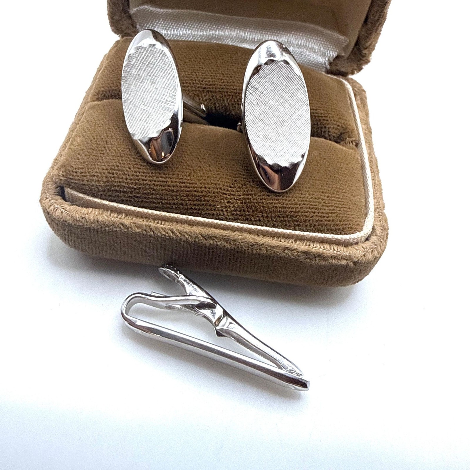 Vintage Swank silver tone textured elongated oval cuff links and tie clip set