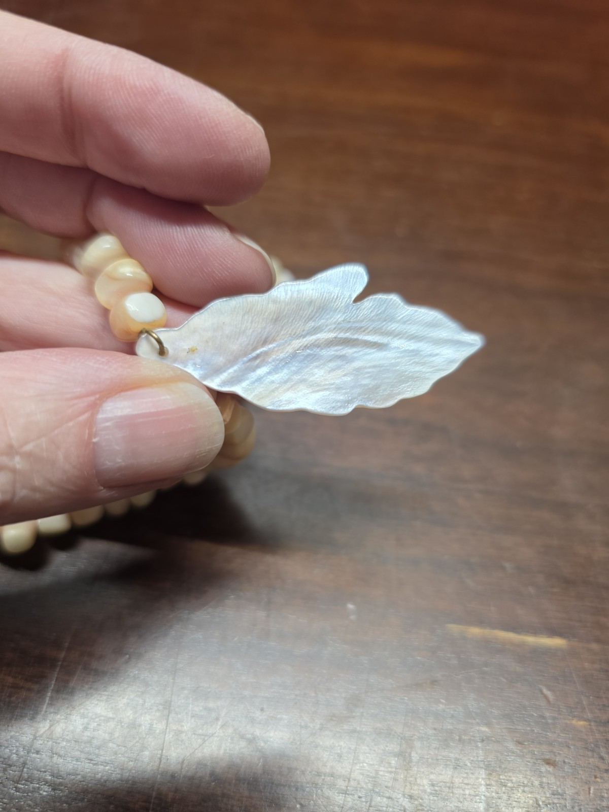 Vintage Coral necklace made of beads and carved shell leaves Gorgeous