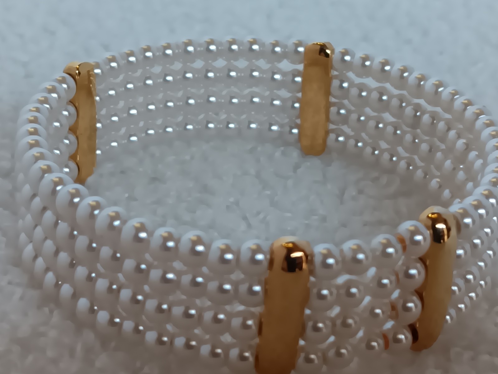 Vintage 4 Strand Faux Pearl Goldtone Tension Cuff Bracelet 7.5 in