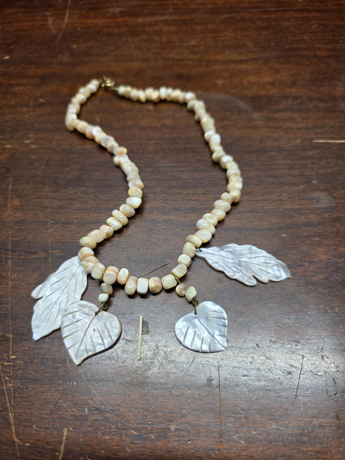 Vintage Coral necklace made of beads and carved shell leaves Gorgeous