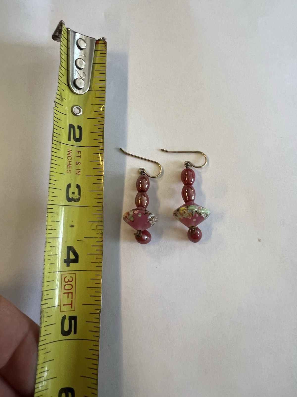 vintage-style dangle earrings featuring pink and green art glass beads