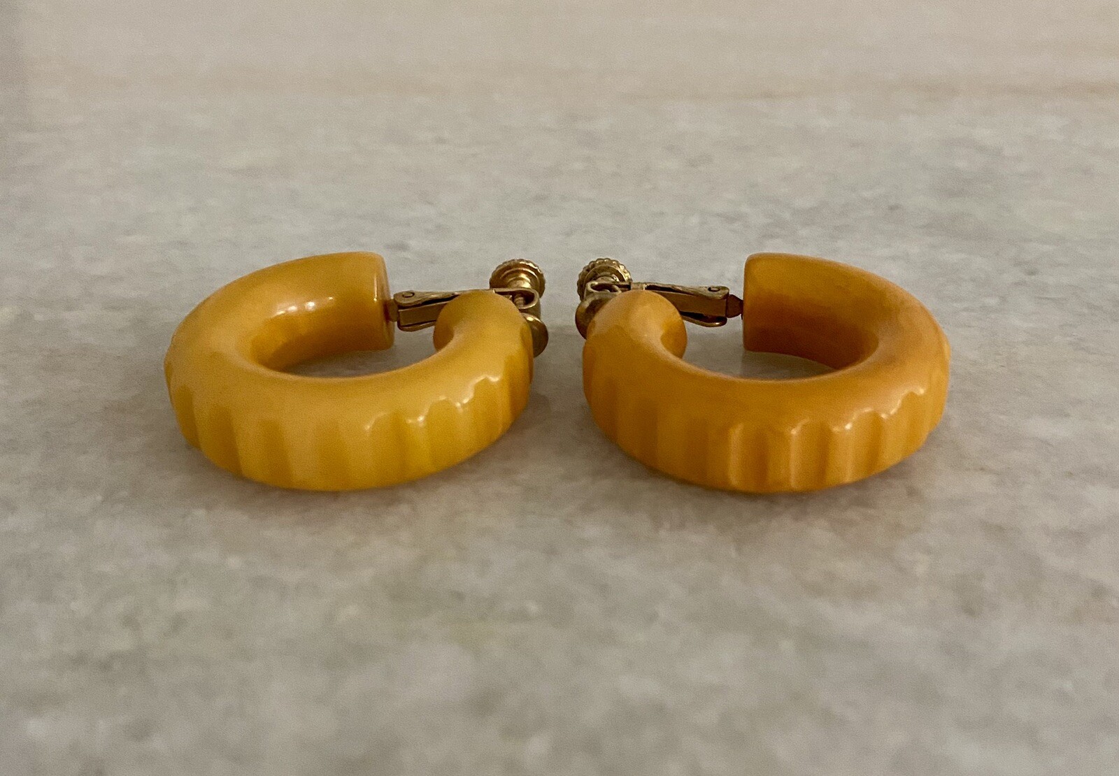 Vintage Butterscotch Bakelite Carved Hoop Adjustable Clip On Earrings