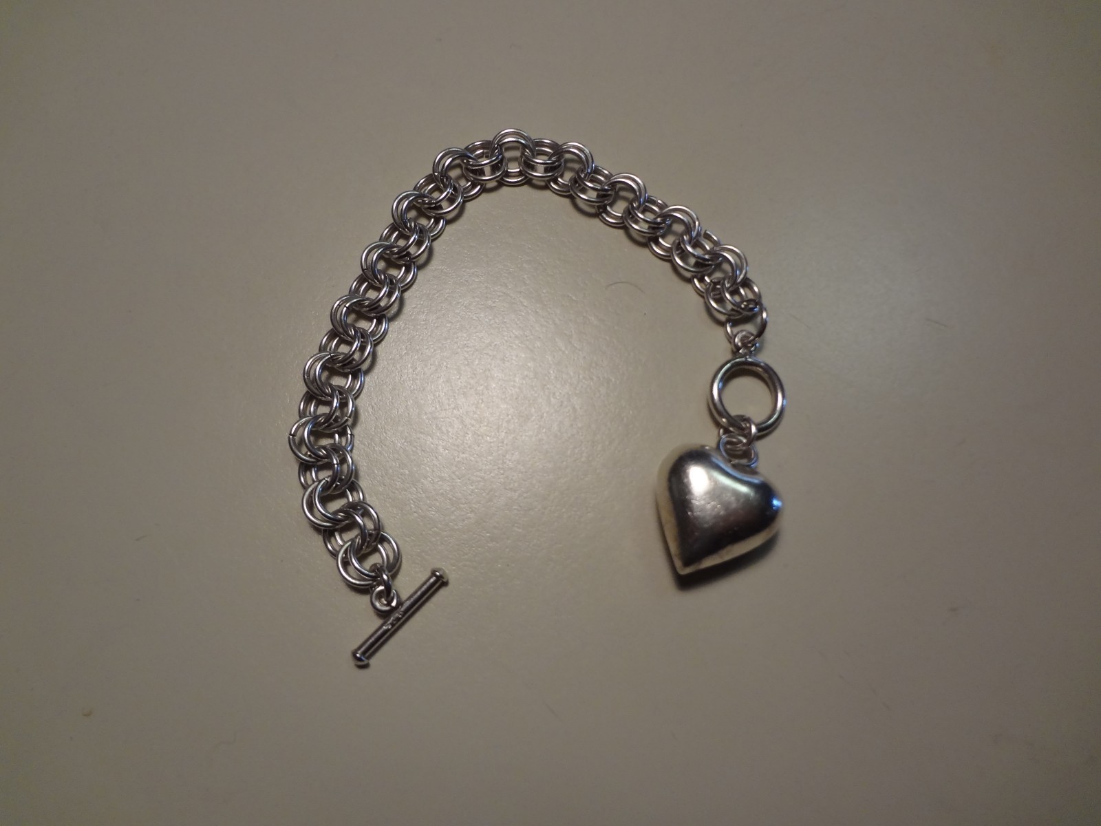 #31-VINTAGE STERLING SILVER DOUBLE LINK BRACELET WITH NICE SIZE PUFF HEART-925