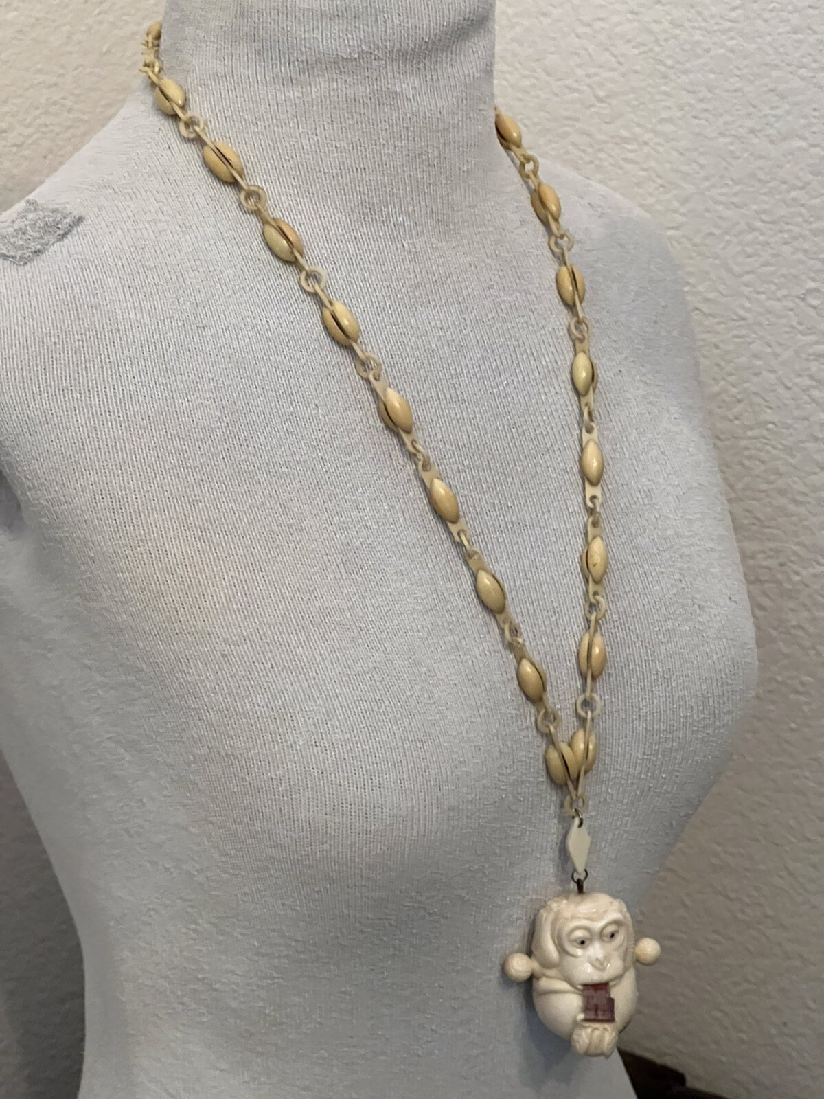 ANTIQUE ART DECO MONKEY NECKLACE TAPE MEASURE CELLULOID CHAIN PENDANT WHIMSICAL