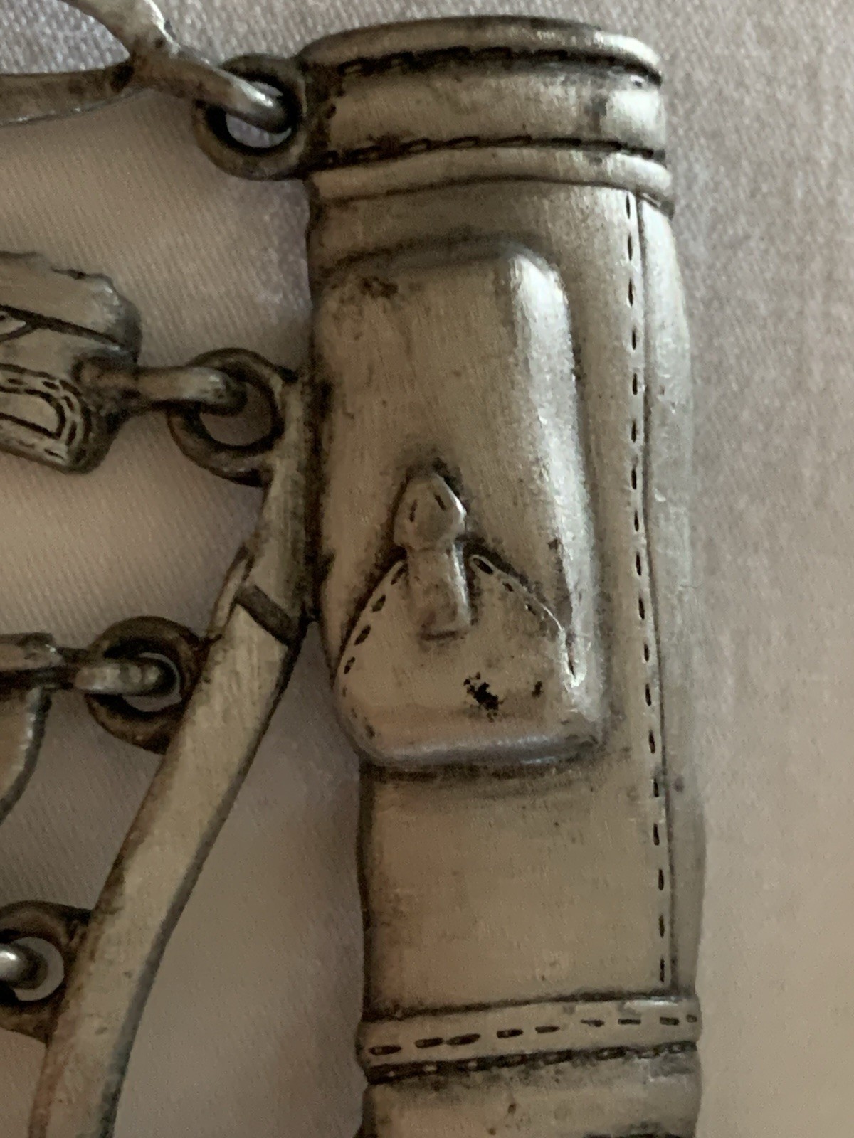 Jonette Jewelry (JJ) golf-themed brooch made of pewter or a similar alloy