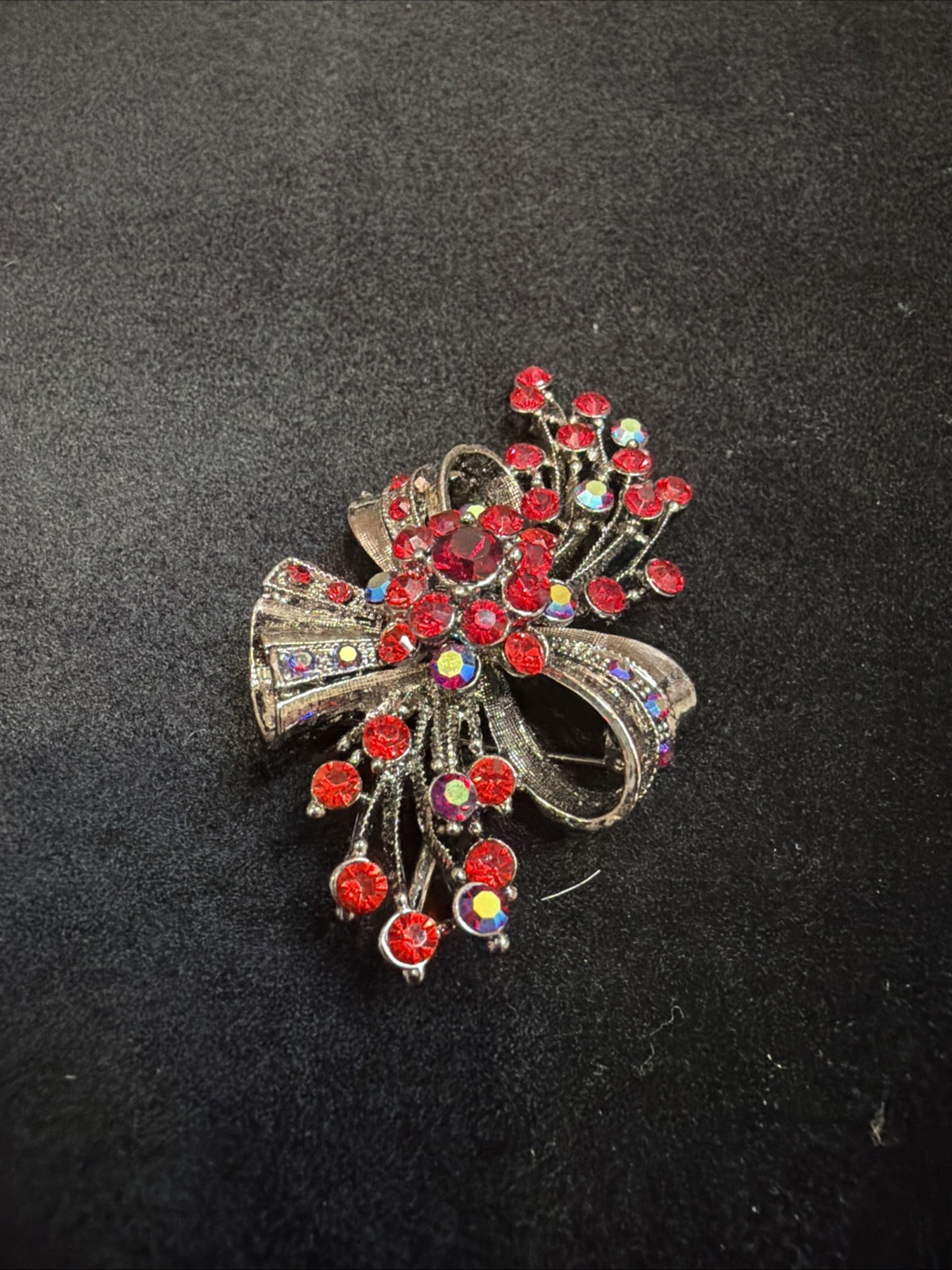 Vintage Bow Brooch Gunmetal-toned With Red Iridescent Rhinestones