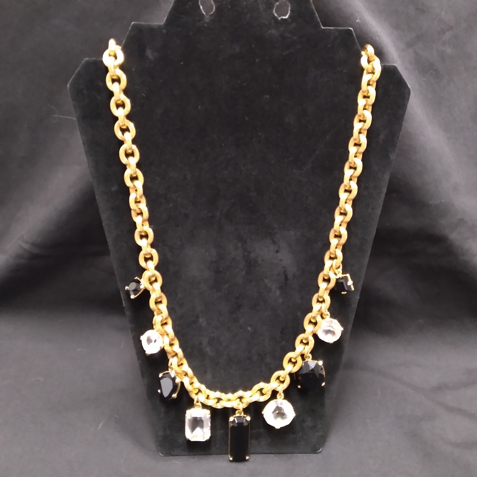 Monet Gold Tone Chunky Necklace with Clear and Black Crystal Charms