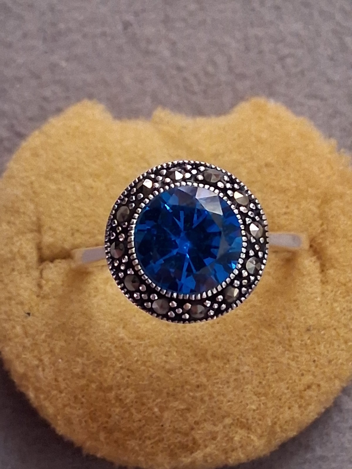 Blue faceted & marcasite halo ring, silverplated, round setting, SZ 6.75