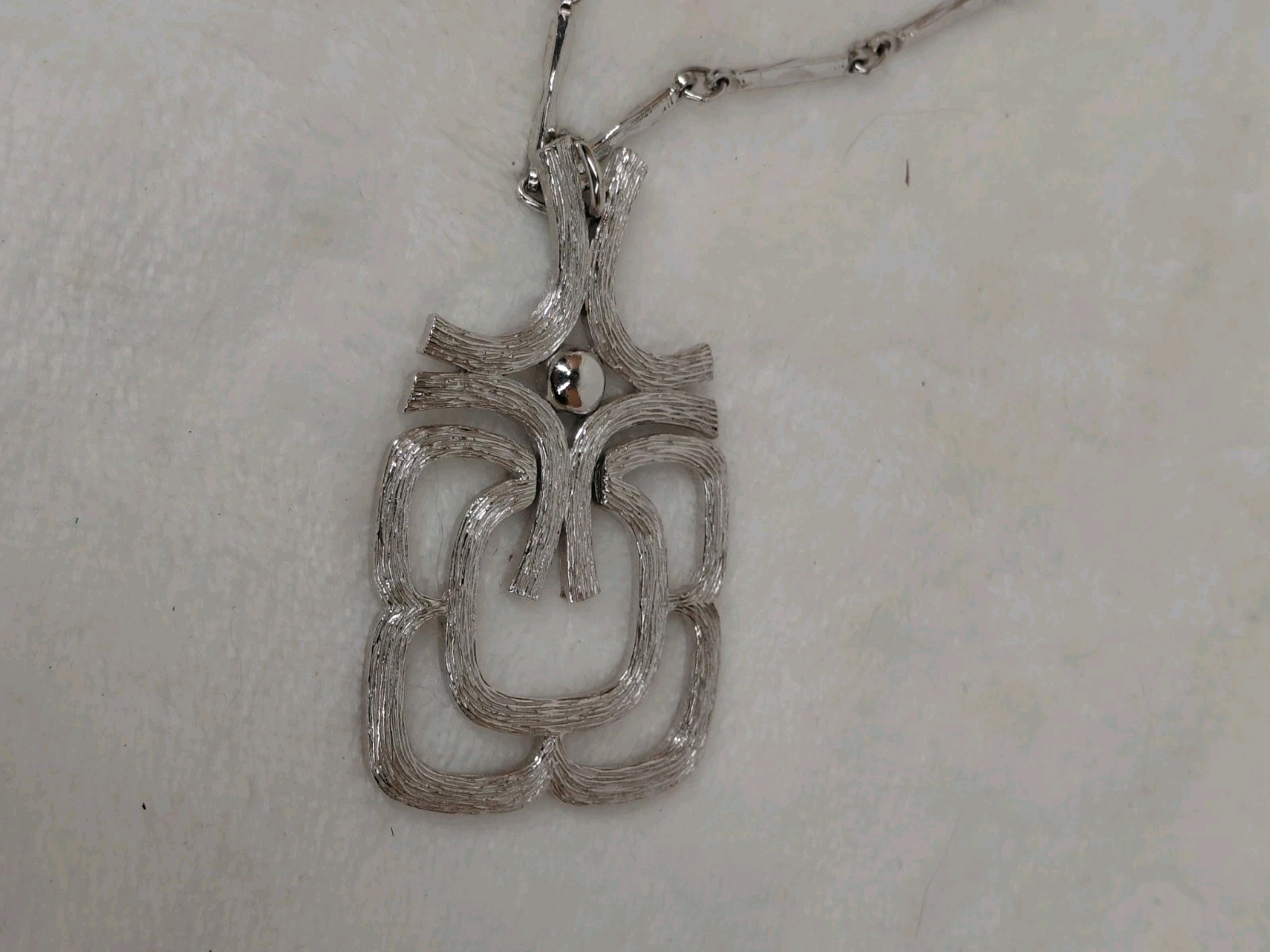 Vintage 1974 Avon Mayan Pendant Necklace Silver Tone Modernist Brutalist Hinged