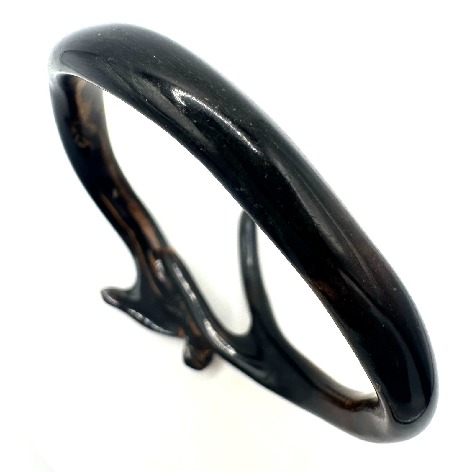 Vintage carved genuine black coral bird figural bypass bangle bracelet