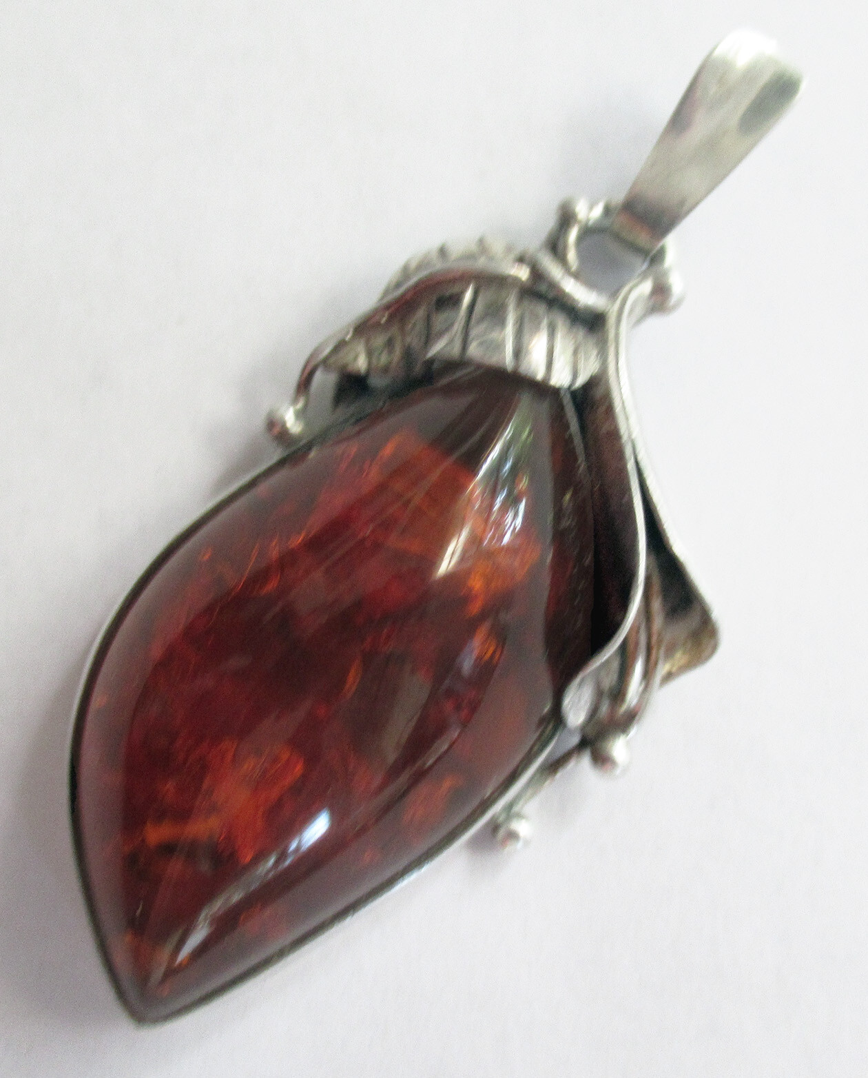 STERLING & AMBER PENDANT -2 3/8 INCHES, 15 GRAMS