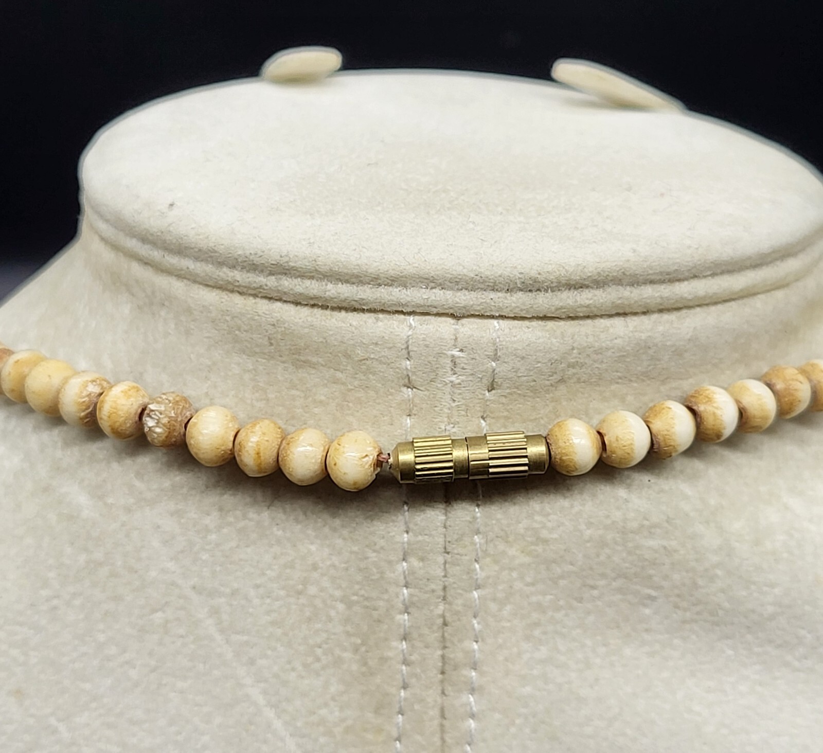 vintage 18″ bovine bone beaded necklace with double face pendant, barrel clasp