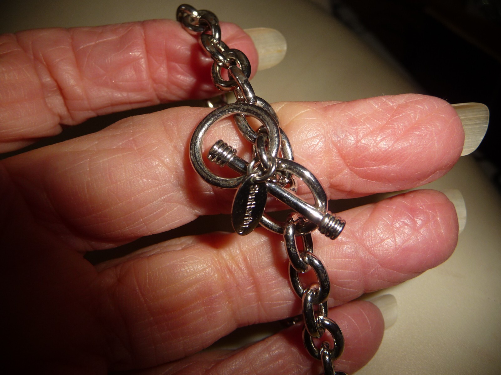 SHUTTERFLY SIGNED SILVER TONE LINK CHARM 6″L x 1/4″ W BRACELET #20/4