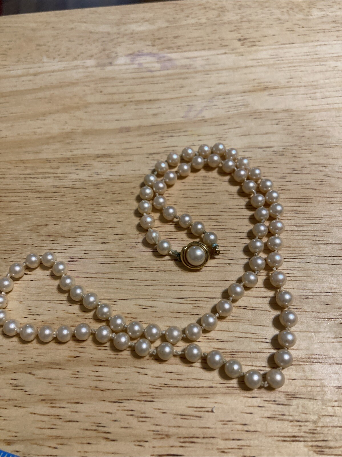 Vintage Trifari Faux Pearl Necklace. 22 Inches. Signed. Knotted