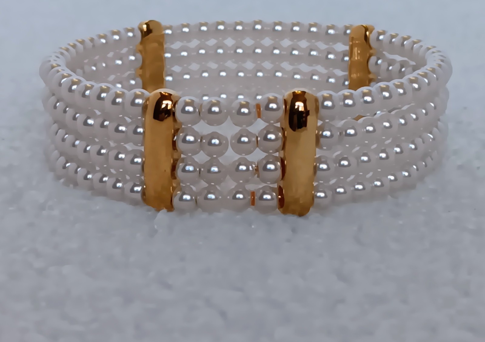 Vintage 4 Strand Faux Pearl Goldtone Tension Cuff Bracelet 7.5 in