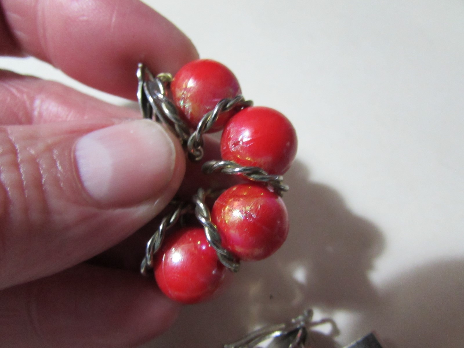 VINTAGE goldtone clip earrings almost 1 1/2″ long red bead half hoop