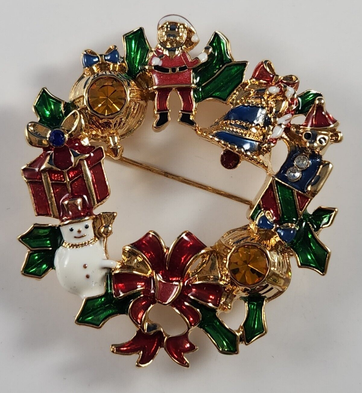 AVON Brooch Pin Christmas Collectible Holiday Wreath Rhinestones Santa Bell 2010