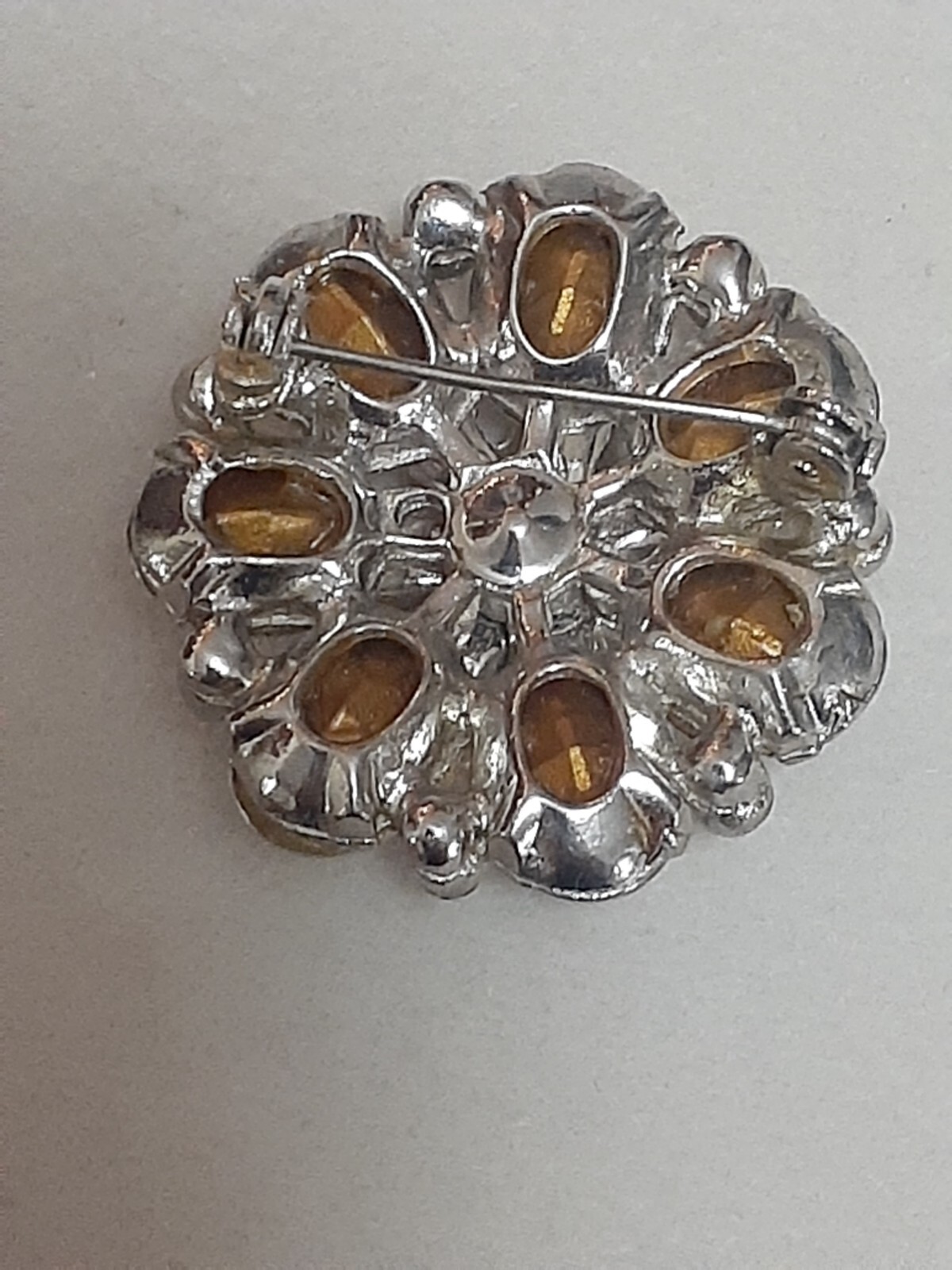 Fauceted foiled back rhinestone cluster round brooch/pin