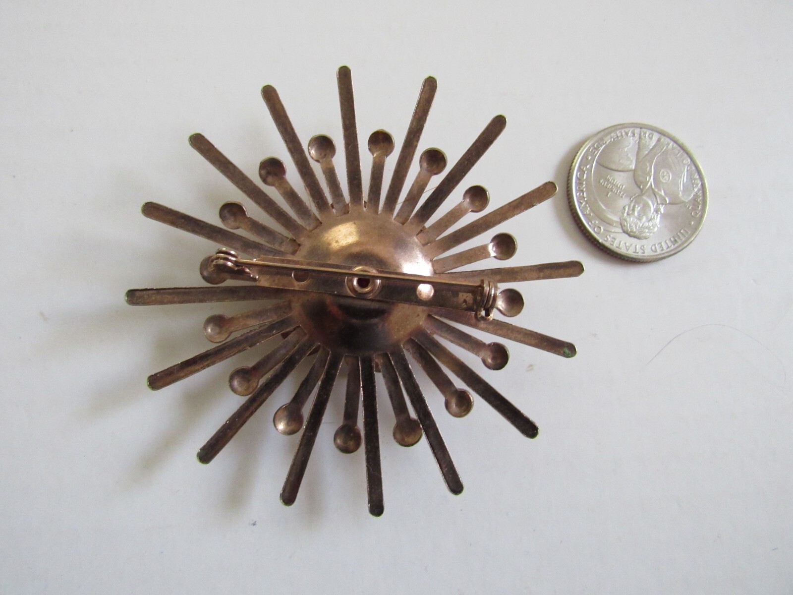 Unbranded Rose Gold Color Starburst Brooch / Pin w Pink Center Stone Vintage