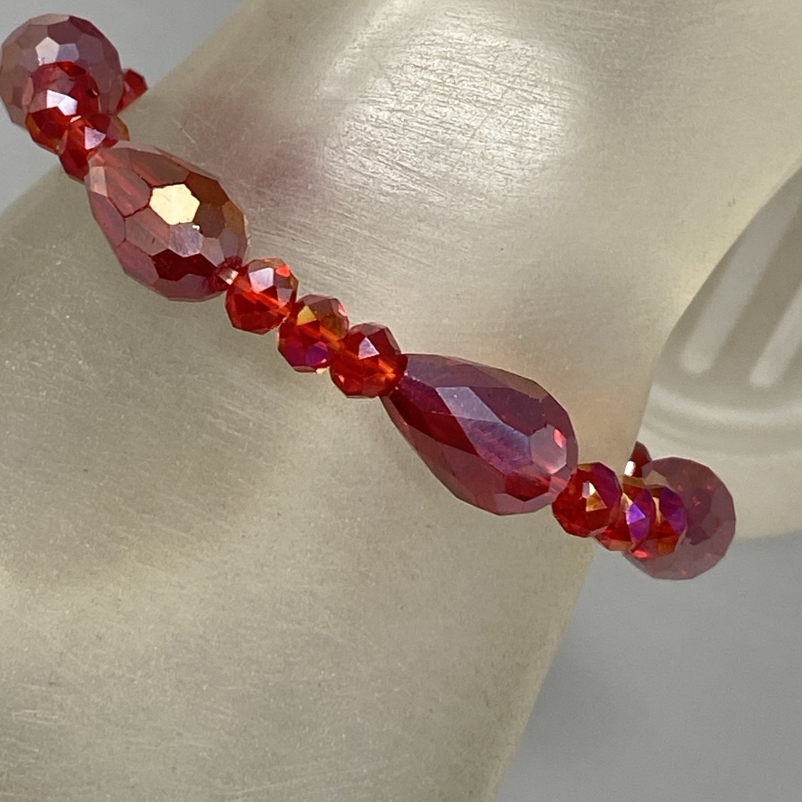 Red Glass Beaded Bracelet Surface Coated Faceted Teardrop Iridescent Stretch 6″
