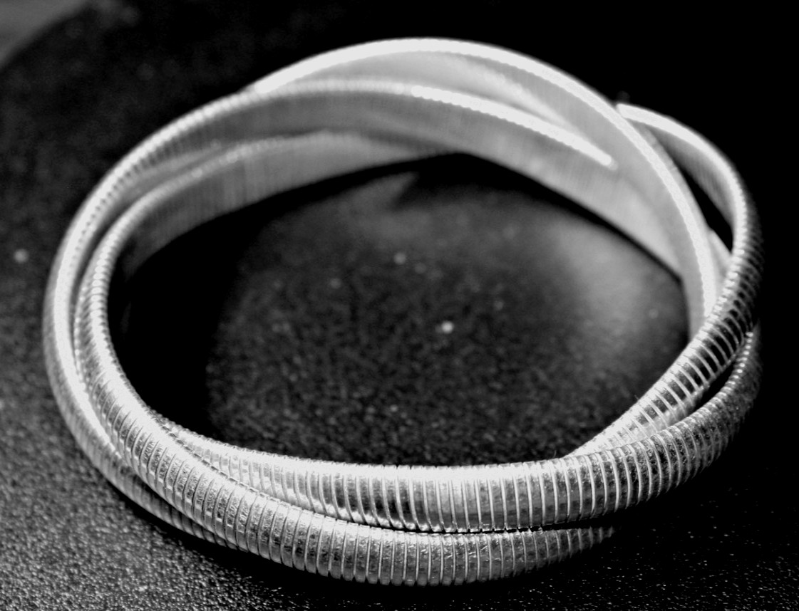 LEONORE DOSKOW STERLING SILVER TRIPPLE STRETCH BRACELET