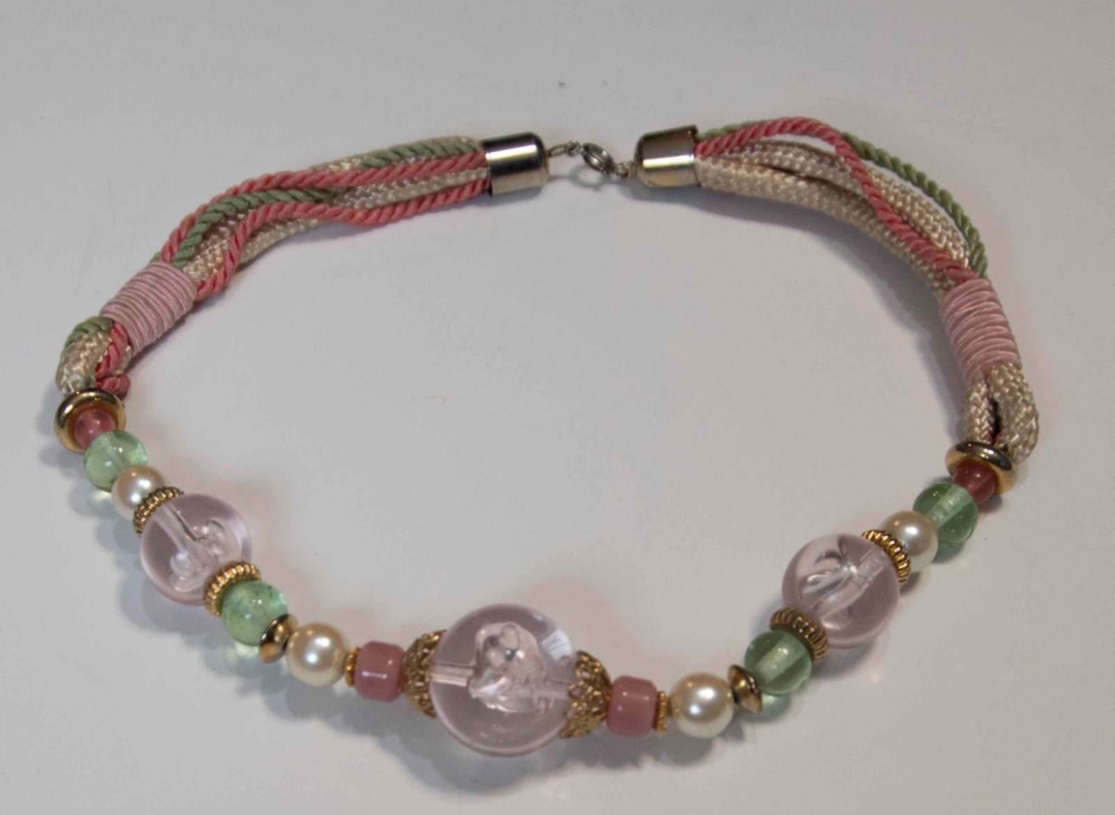 vintage pink and green glass bead necklace with a braided cord band J012