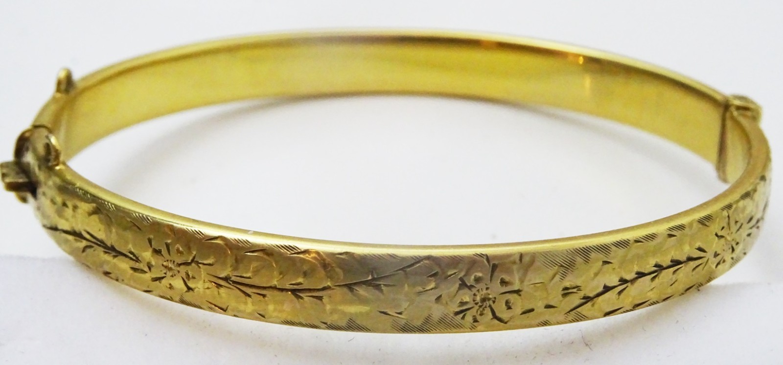 Vintage Hinged 9 karat Gold Bangle with Metal Core