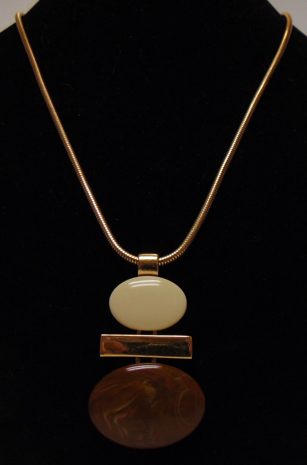 AVON Round Articulated Cream and Brown with Gold Tone Pendant Necklace