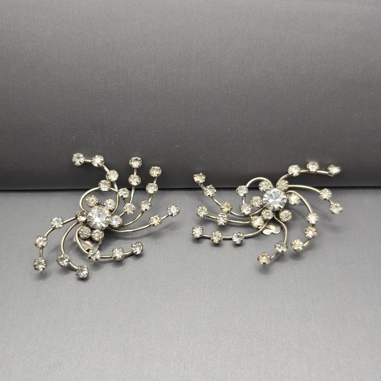 Vintage Rhinestone Clip On Earrings 2.25″ Silver Mid Century Atomic Starburst