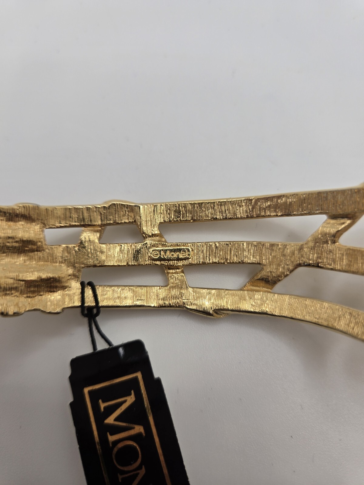 Signed Vintage MONET Hindged Polished Gold Tone Bracelet