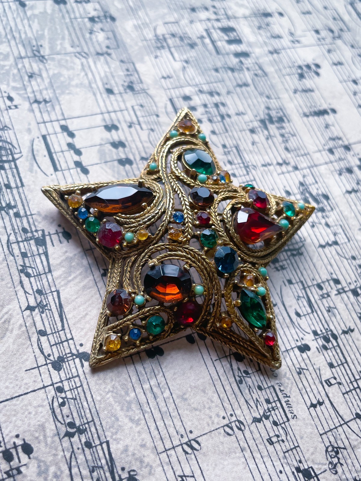 Vintage La Roca Gold Alloy Multicolor Rhinestone Star Brooch