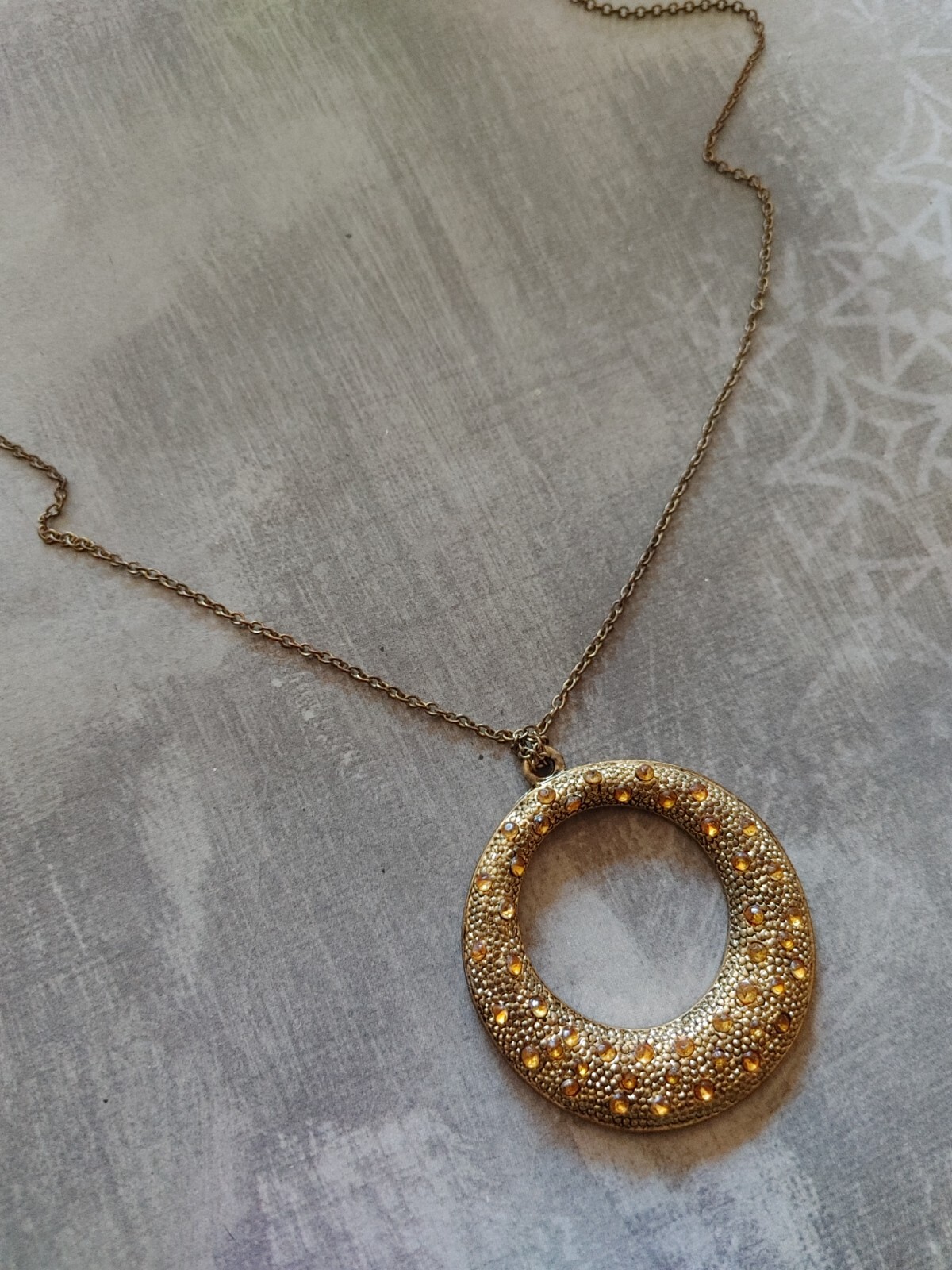 Vintage necklace gold tone metal circle yellow rhinestone signed Gwen