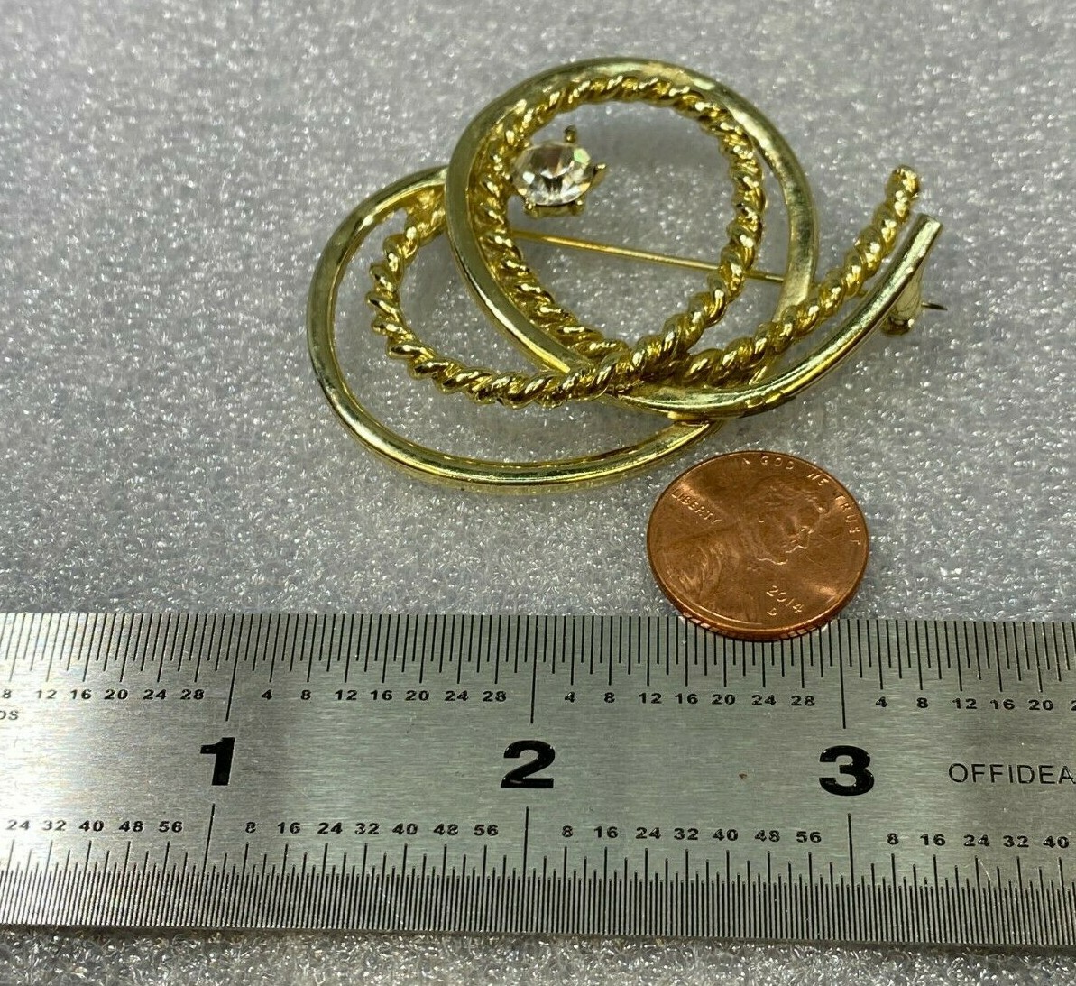 Vtg Clear Glass Rhinestone Gold Tone Loopy Rope Texture & Smooth Curl Brooch Pin