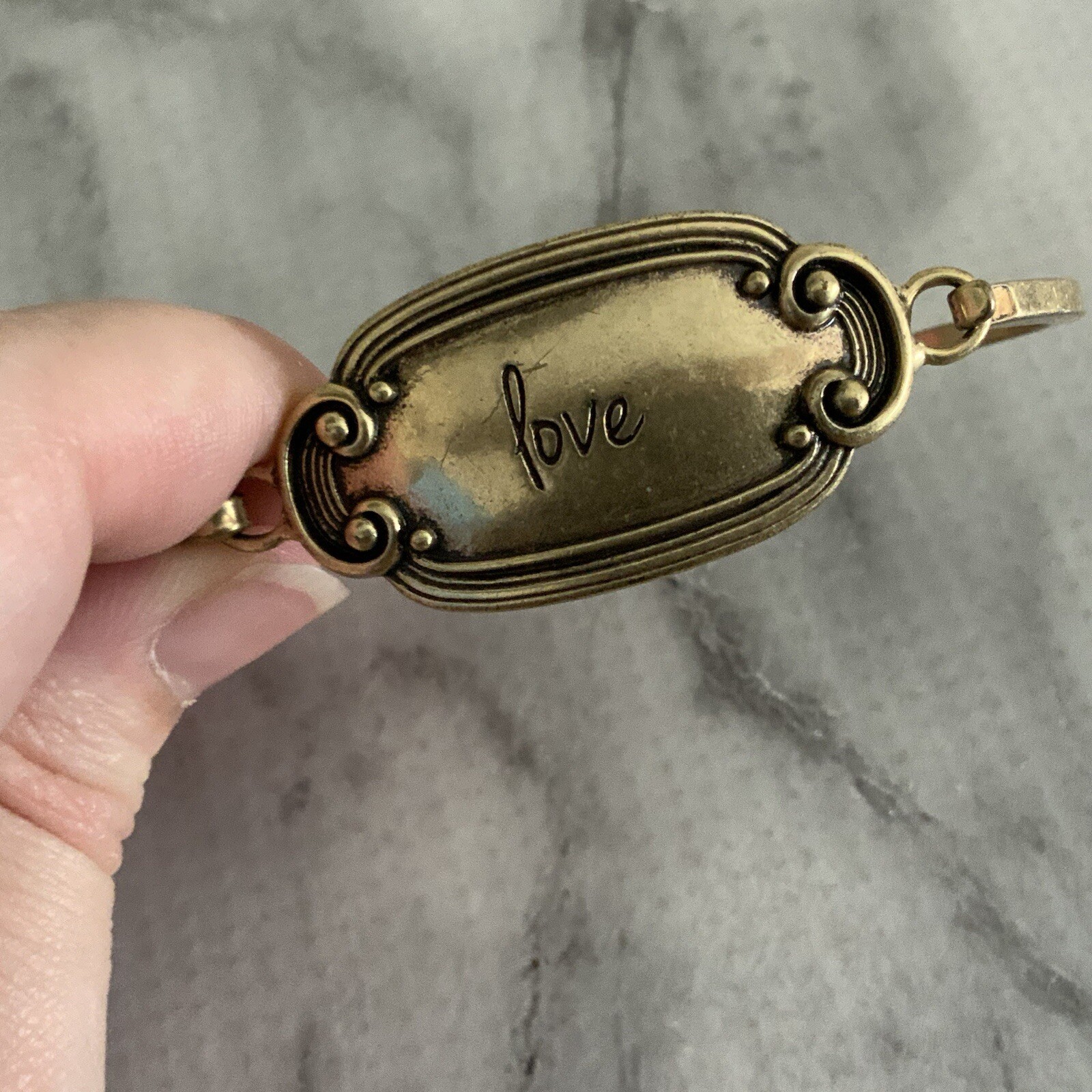 Victorian revival cursive antique gold Love panel tension bangle bracelet