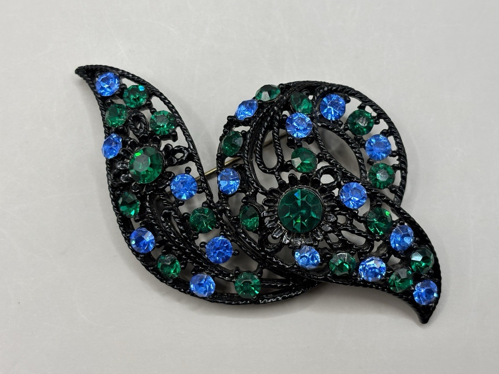 Teardrop & Paisley Blue & Green Rhinestones set in Black Earrings and Brooch