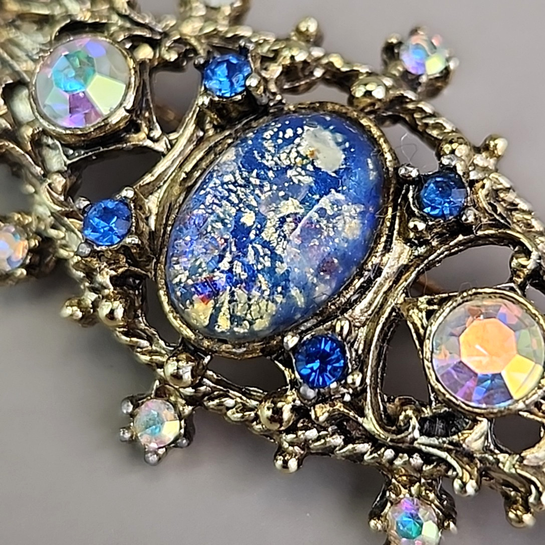 Vintage Foiled Glass Brooch Aurora Borealis Blue Oval Gold Tone 2 3/8″
