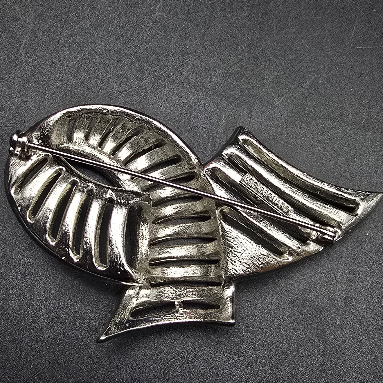 Les Bernard Swirl Ribbon Rhinestone Brooch Black Enamel Silver Tone