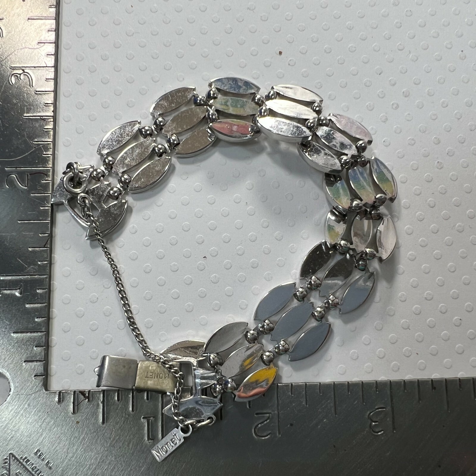 Vintage MONET 5/8″ x 7 1/4″ SILVER TONE heavy bracelet with safety chain