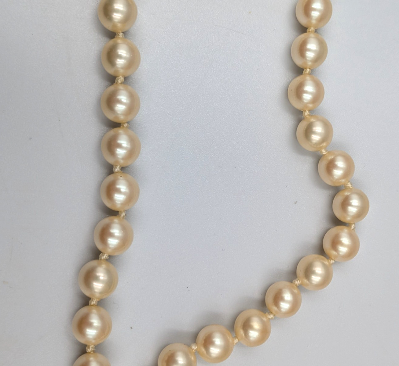 28 inch faux pearl necklace knotted with fish hook clasp unmarked vintage